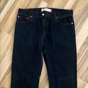 Men’s black Levi jeans.